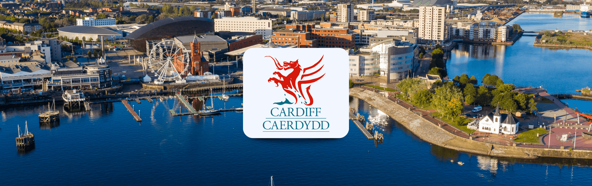 alt="Cardiff Council logo over an aerial view of Cardiff Bay, representing Matrix’s workforce partnership with Cardiff Council."