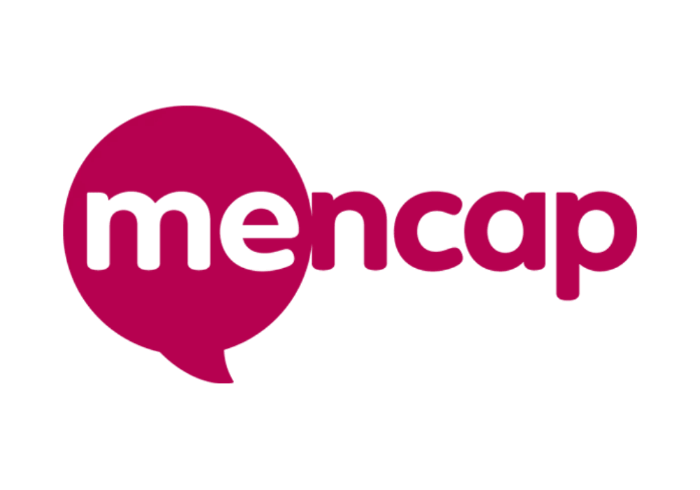 Mencap logo featuring the word "mencap" in lowercase pink letters, integrated with a speech bubble design in the background.