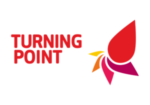 Red and orange stylised logo with the text "Turning Point" next to a multi-coloured abstract shape resembling a spiral or flower petal.